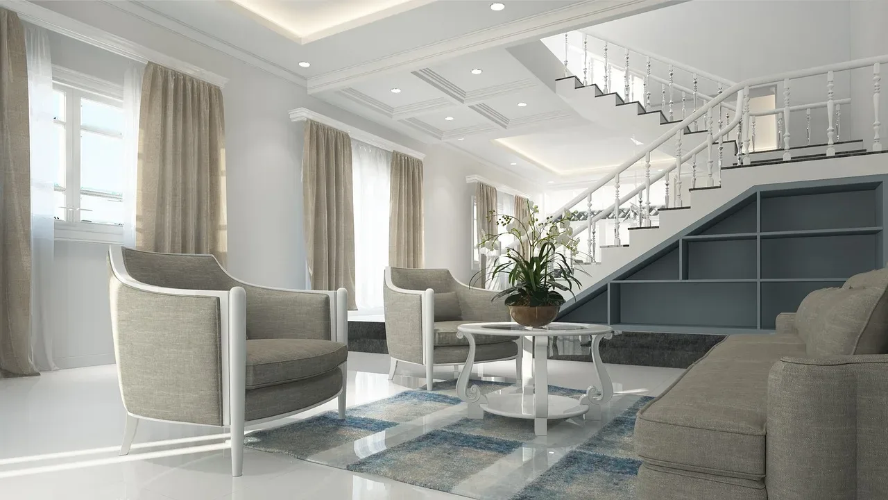Bright living room with white furniture and large windows